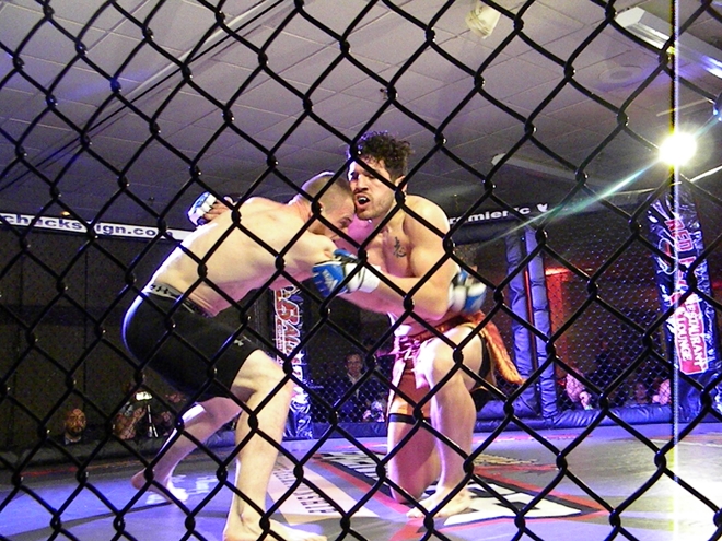  Pat "the Ninja Gorilla" Casey, left, and Angelo Richardson battle March 11 at Premier FC 22 in Agawam, MA