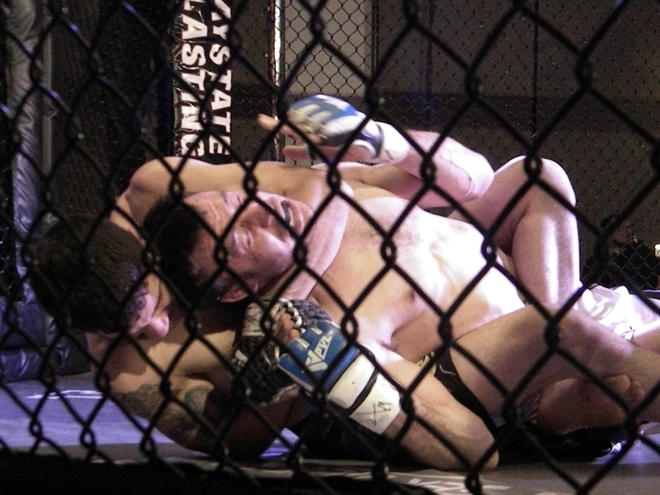 Nick Fiori chokes Charles Bonar on March 11 at Premier FC 22 in Agawam, MA