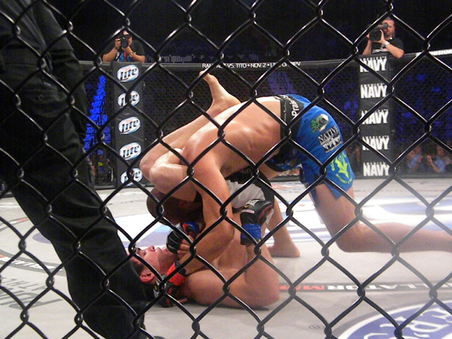 Lightweight MMA fighters Patricky Pitbull, bottom, and Derek Anderson