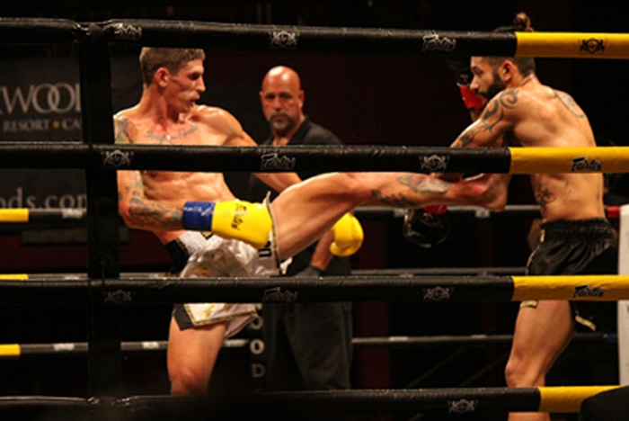 Jessi Hackett, left, versus Yeison Berdugo at Lion Fight 38