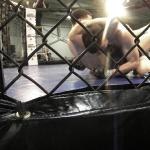 Mike Kimbel attempts to secure a guillotine choke on Randy Francis during AFL 1 on Feb. 25.