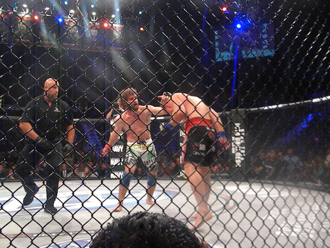MMA middleweight fighters Brett Cooper, left, and Alexander Shlemenkl
